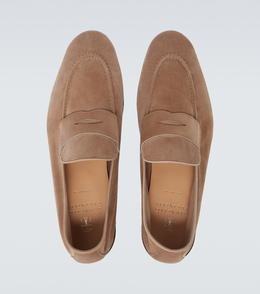 Penny loafers in beige suede