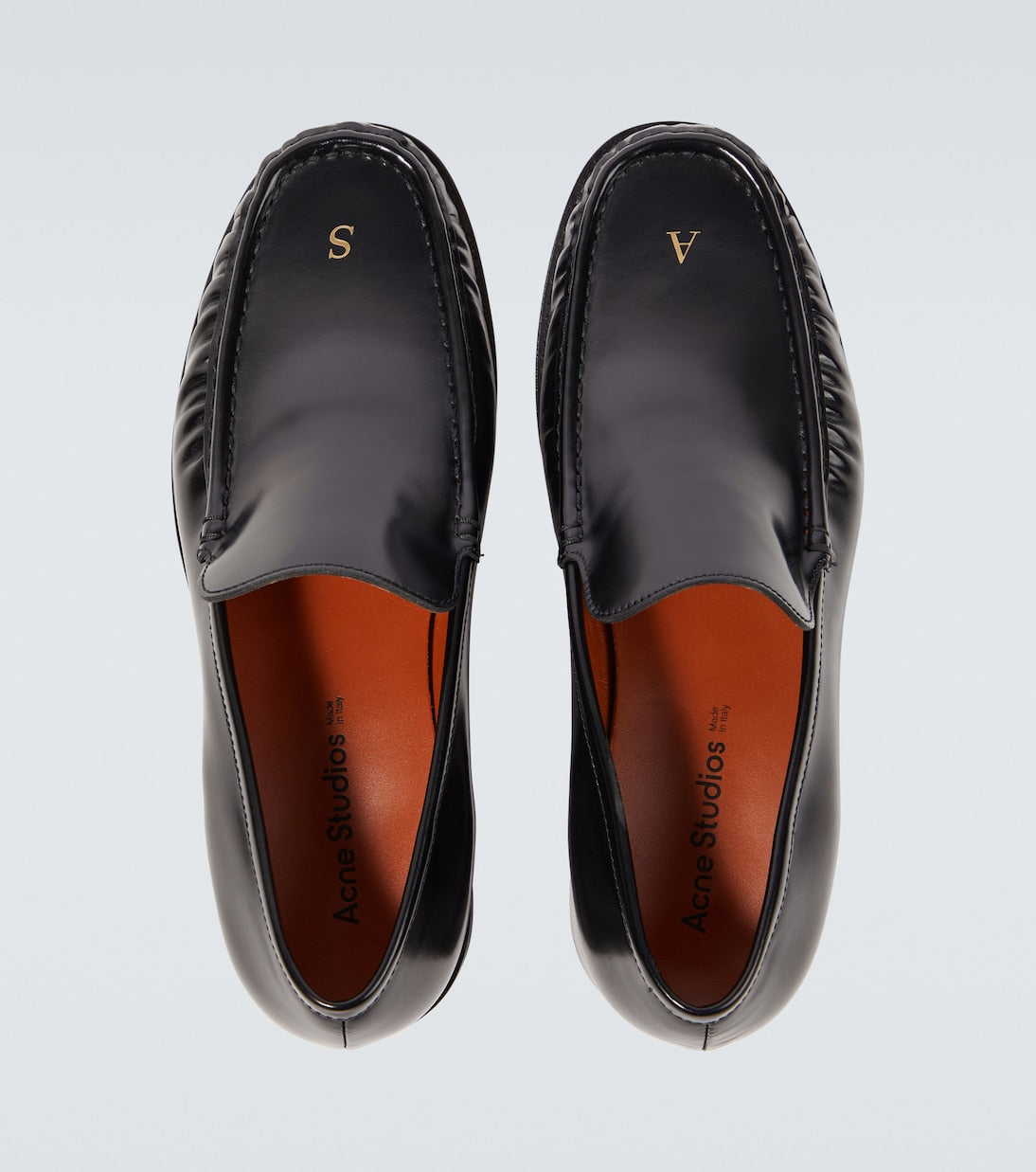 Black leather loafers