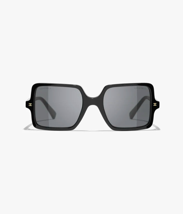 Occhiali da sole squadrati in acetato nero con lenti grigio scuro