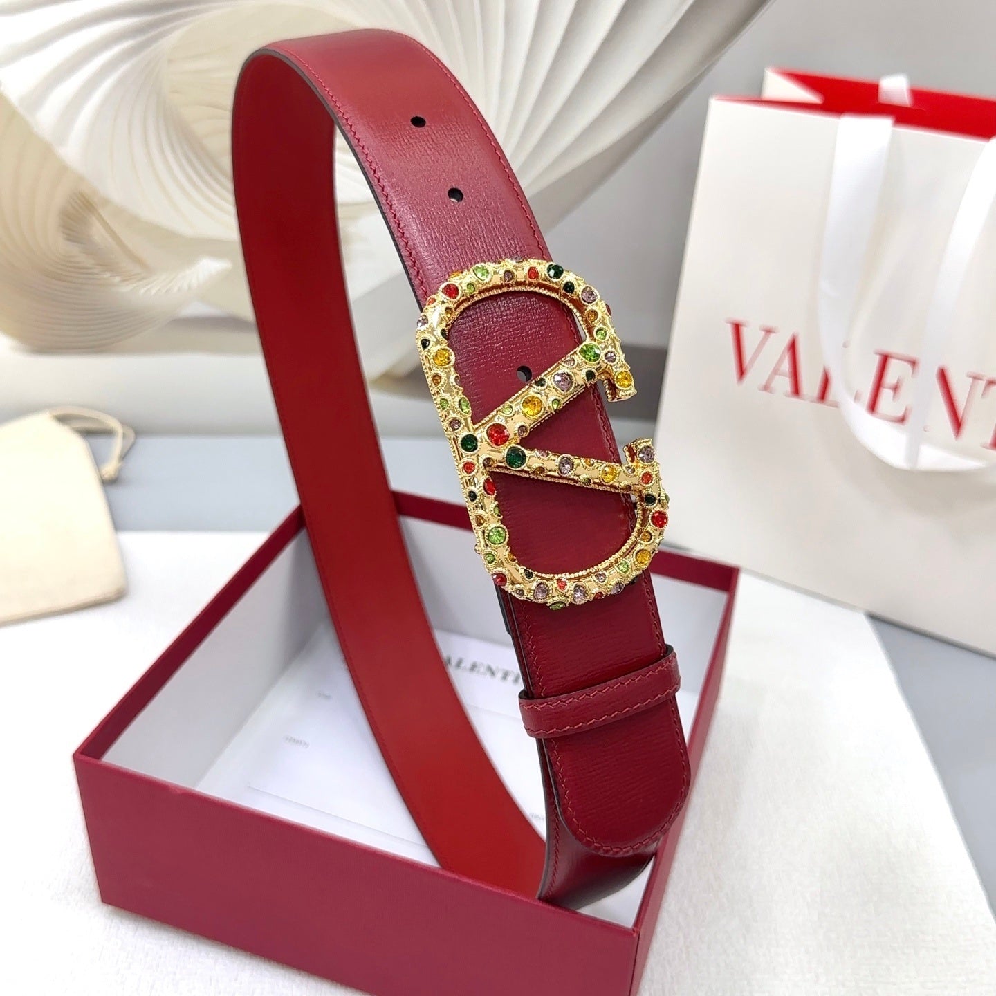 Reversible bordeaux VLogo Signature belt embellished with multicolored Swarovski crystals