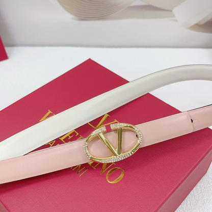 Pink patent leather belt with V logo and crystals