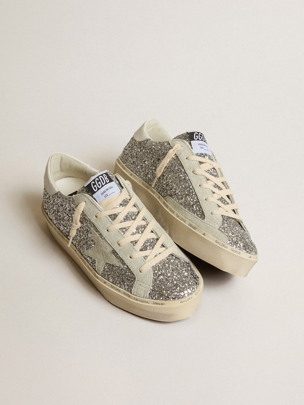 Glitter argento con stella in suede e talloncino bianco