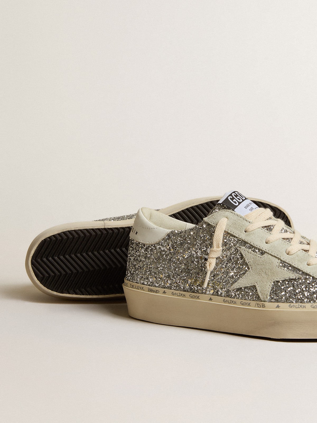 Glitter argento con stella in suede e talloncino bianco