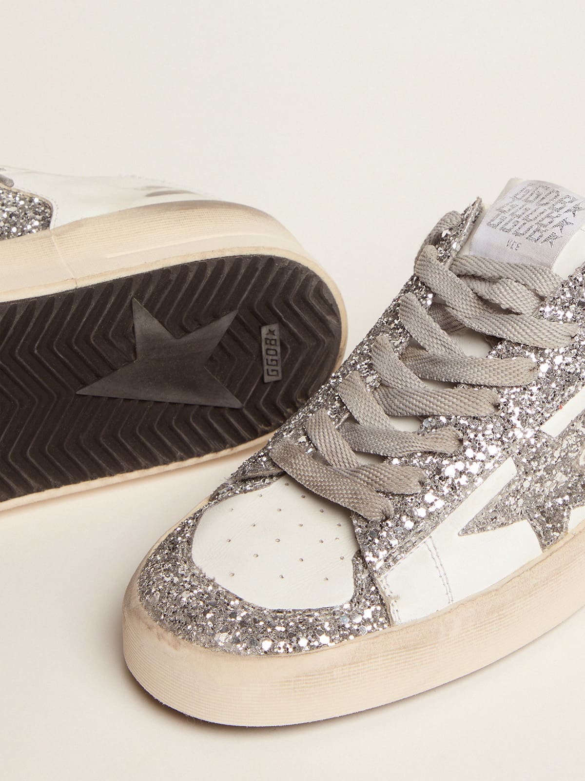Pelle bianca e glitter
