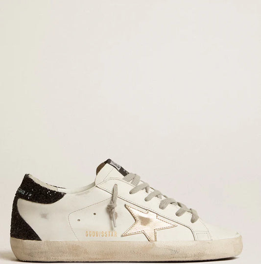 Stella oro e talloncino in glitter nero