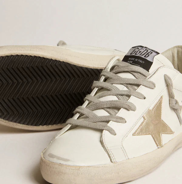 Stella oro e talloncino in glitter nero