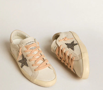 LTD in pelle con stella in suede beige con borchie Swarovski